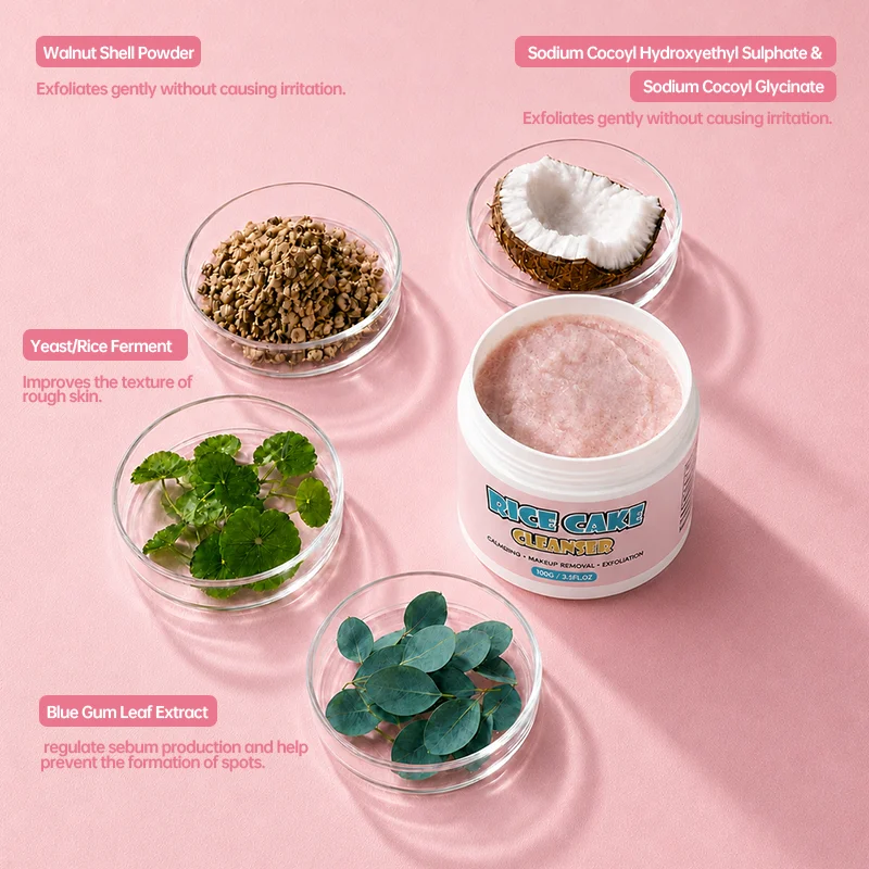 Rice Cake Cleanser surrounded by natural ingredients including walnut shell powder, yeast/rice ferment, blue gum leaf extract, and coconut components on a pink background.